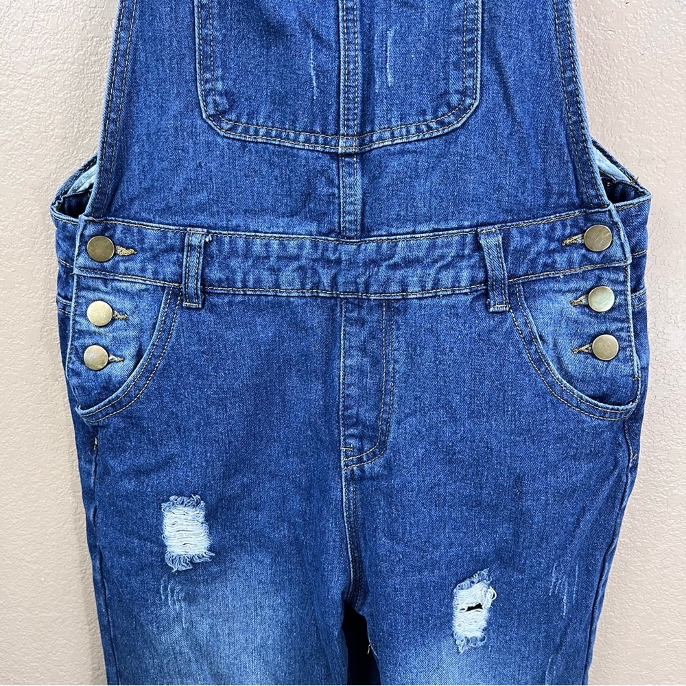 Distressed women’s denim overalls - Picture 3 of 7
